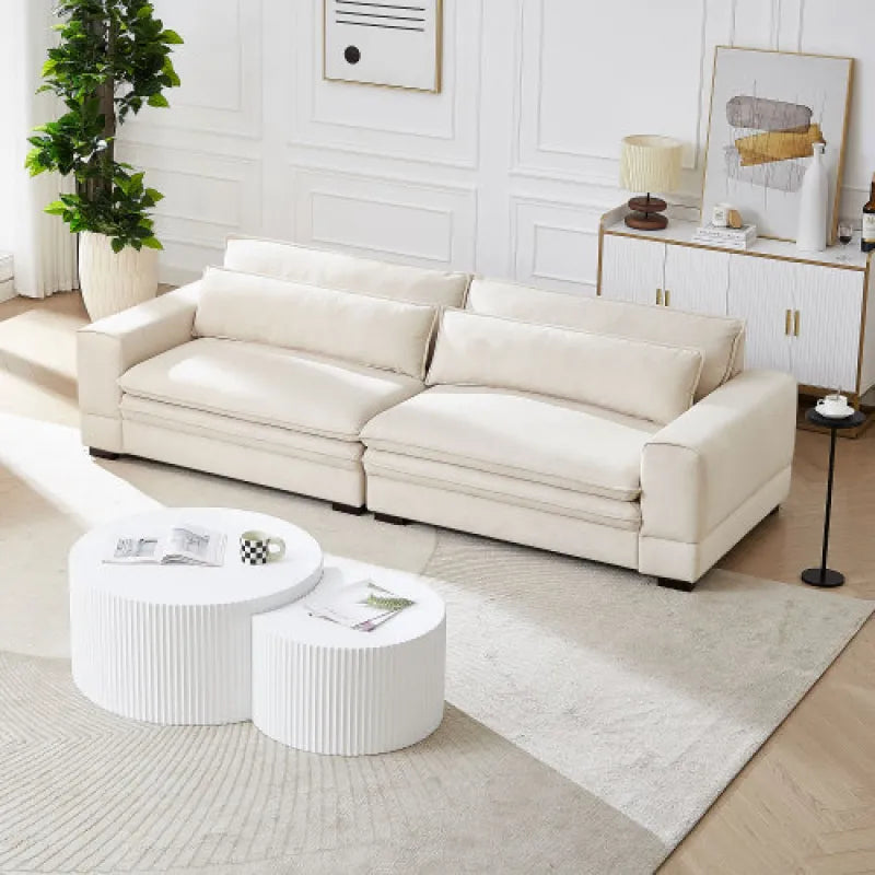Medieval beige four-seater sofa, three-quarter view