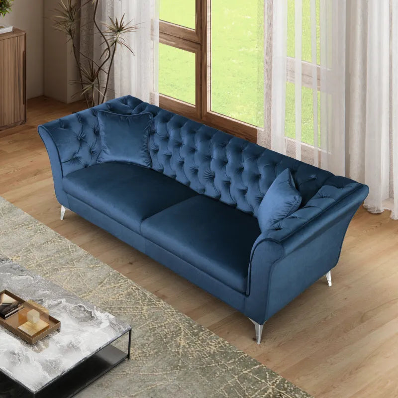 Close-up of the deep button tufting on the Winslow Chesterfield sofa